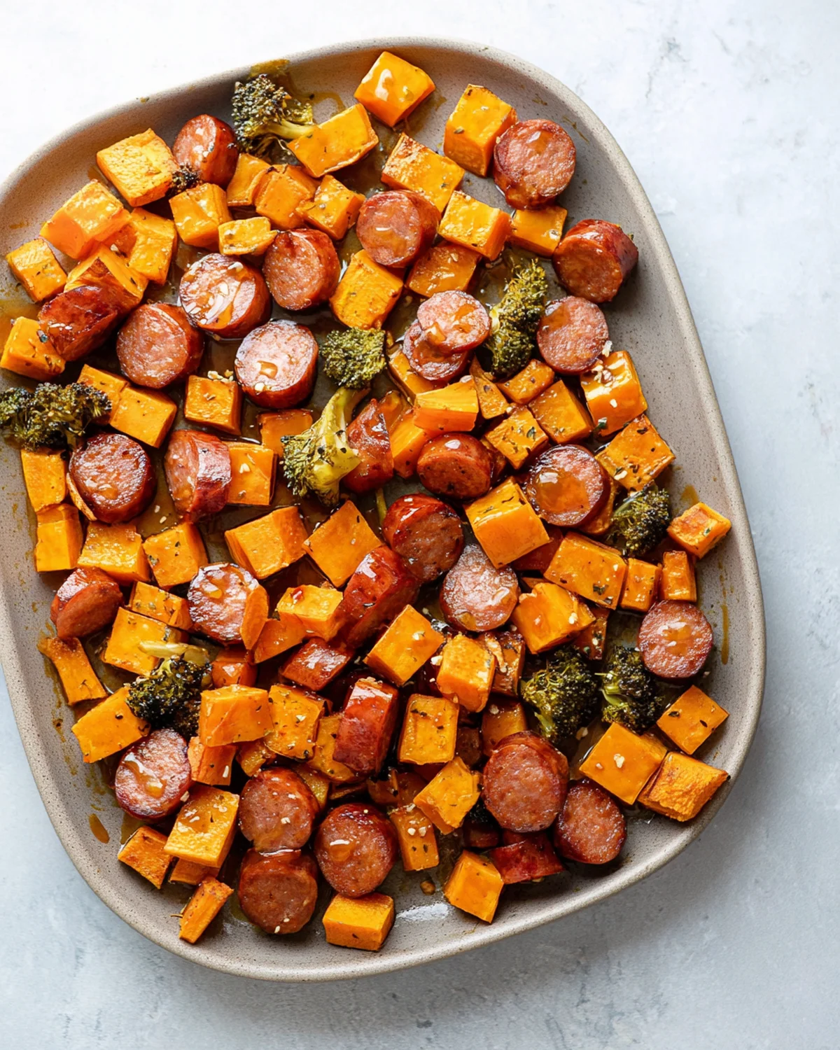 Sheet Pan Sausage and Sweet Potatoes with Honey Garlic Sauce - Image 3